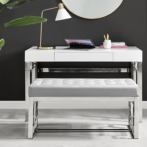 sleek white gloos desk with drawer and chrome geometric deco leg frame, with matching velvet-seat bench.