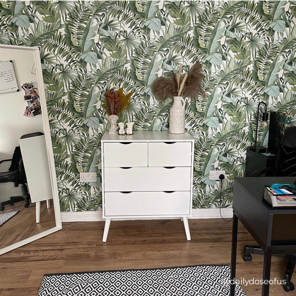 A chest of drawers designed for a bedroom being used as home office storage