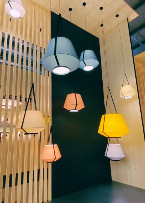 lighting display featuring lantern style lampshades in pastel colours