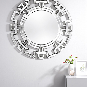Furniturebox UK Aztec mirror - round mirror in a chrome and mirror frame formed of crenallation pattern. 