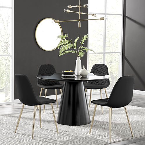 black round table with tapered plinth leg and 4 black faux leather chairs with gold legs