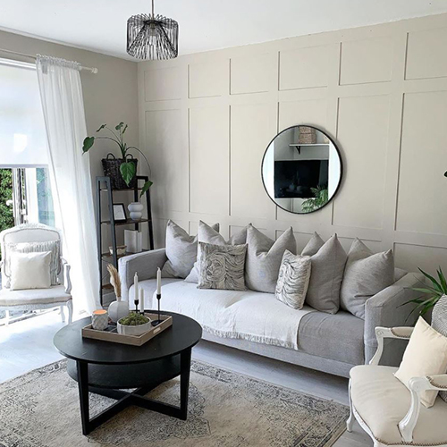 modern living room wth coffee table with centrepiece tray on it