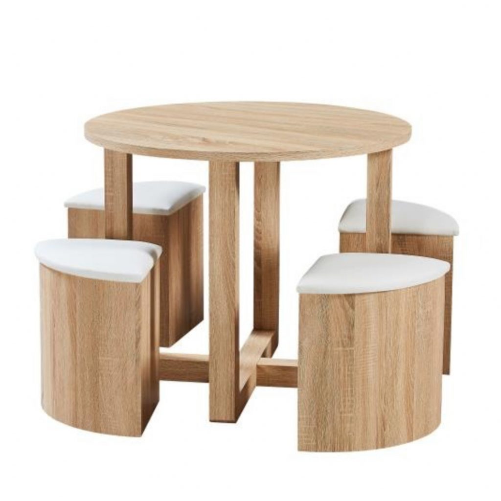 The Oxford space saving wooden dining set with the chairs out