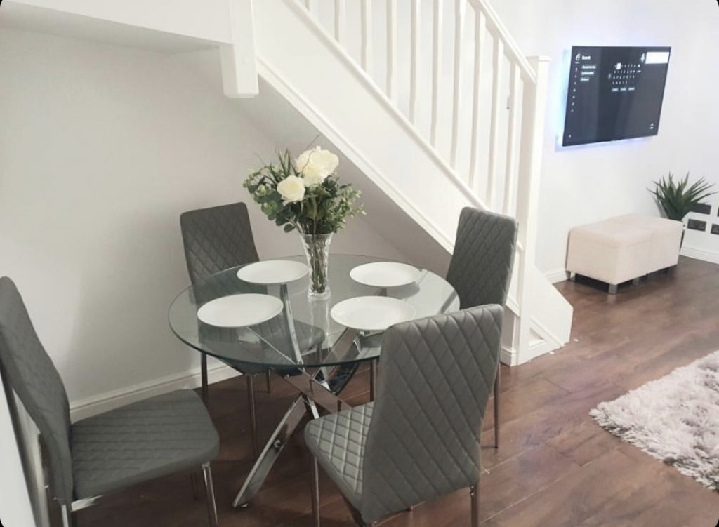 Space saving dining set being used next to the stairs