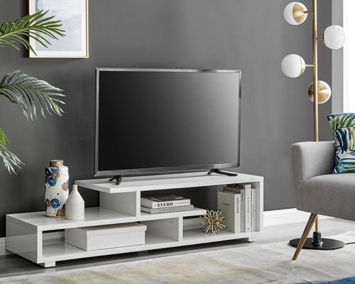 modern white high gloss TV stand with storage shelves and black flat screen TV 