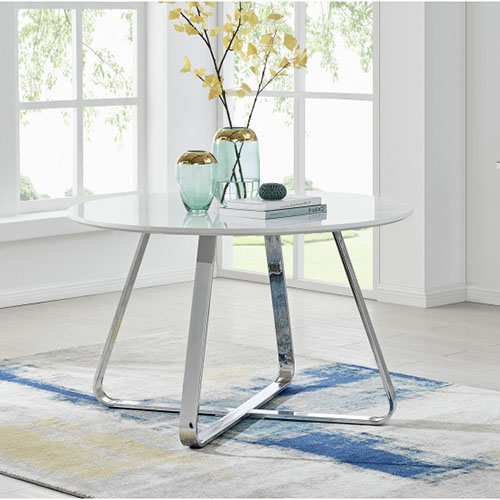 round high gloss child friendly dining table in a bright white room