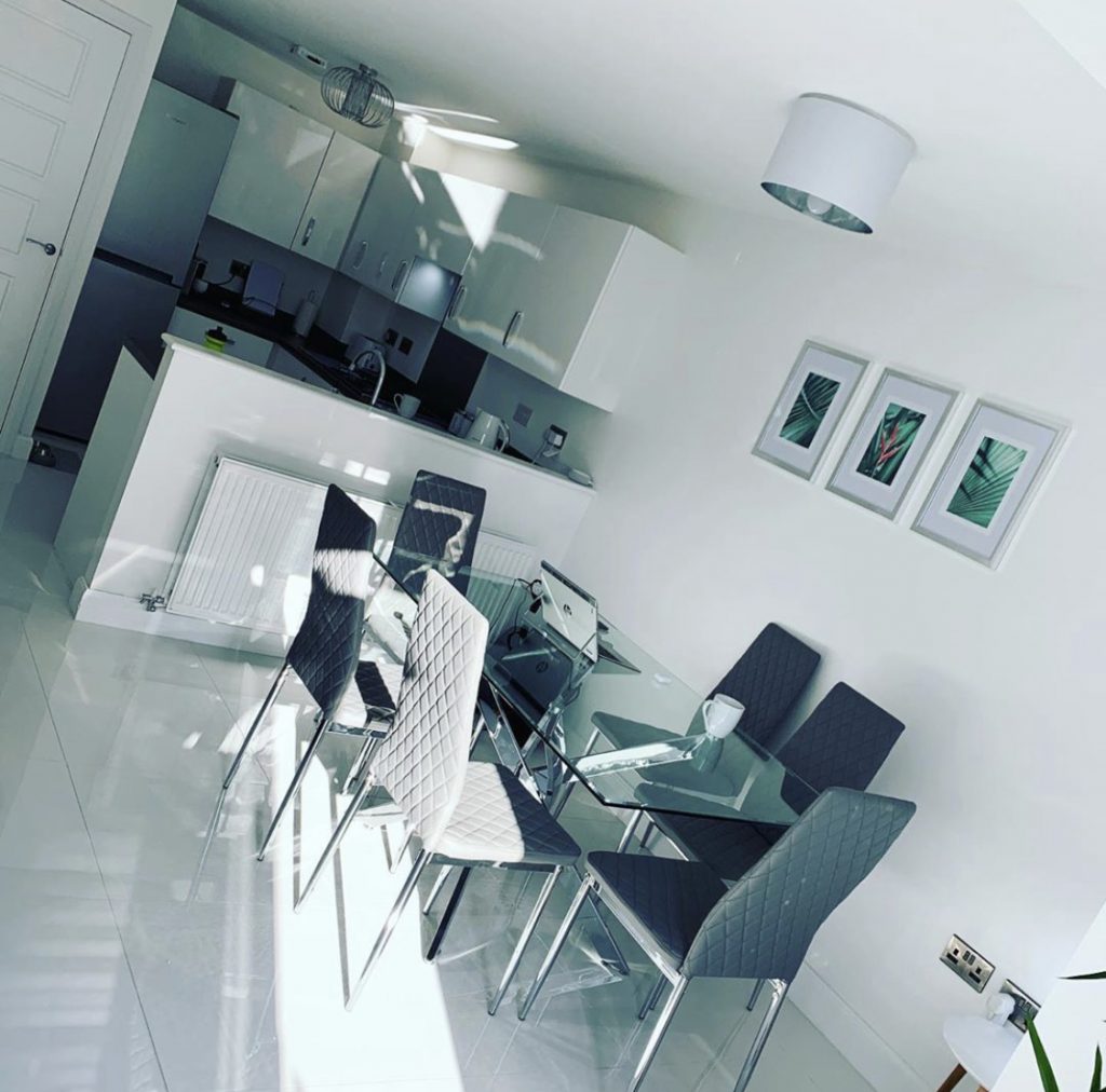 Brand new white tiled flooring used in a dining room