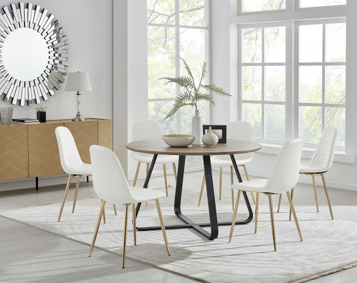 A warm and inviting dining room with wooden round dining table and white scandinavian dining chairs