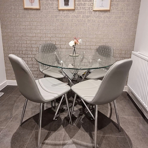 modern dining room with brick effect wallpaper.