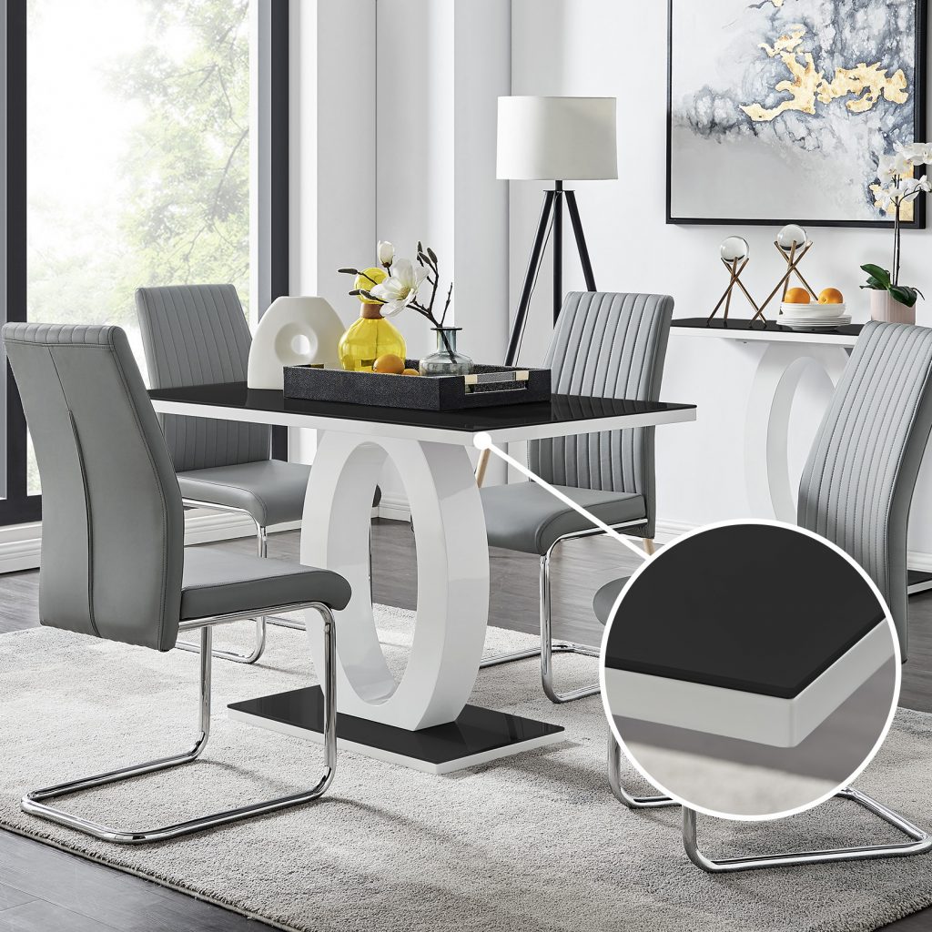 the Giovani contemporary dining table with 4 grey dining chairs in a modern dining room