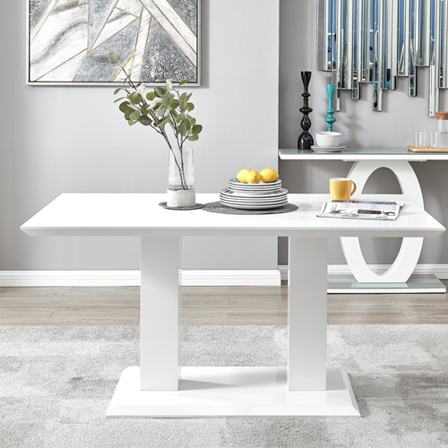 white gloss dining table with pillar base in a light grey dining room