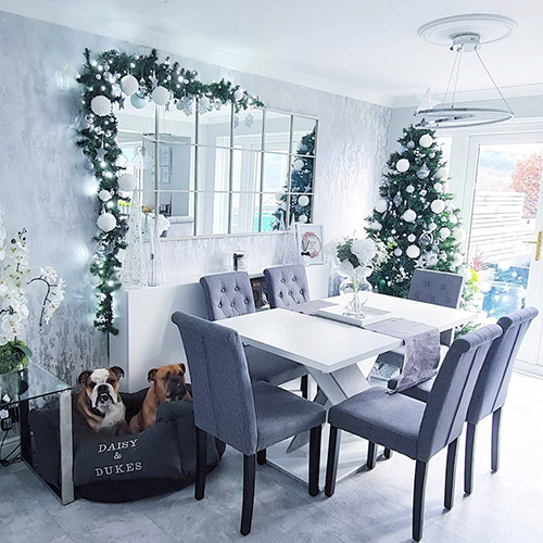 modern dining room with christmas tree