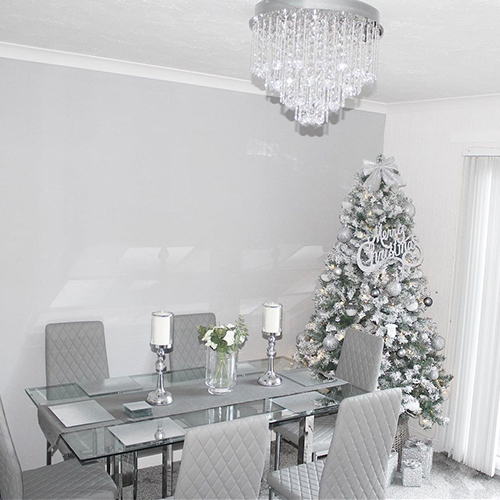 modern dining room with christmas tree