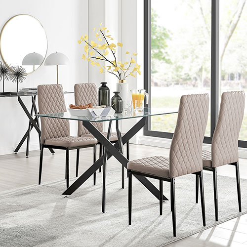 rectangular glass dining table with black metal nested starburst legs and 4 tall back faux leather chairs with black legs.