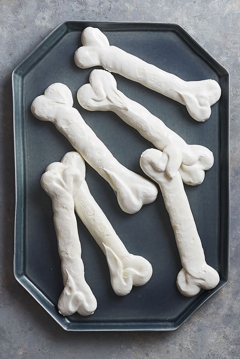 Meringue snacks in the shape of bones
