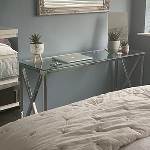 funriturebox uk console table being used as a slimline bedroom desk, with laptop shown on it - home renovation through multi-purpose furniture