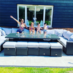 Danielle Lloyd's garden furniture area, featuring U-shape arrangement of rattan furniture - home renovation through expanding living space outdoors