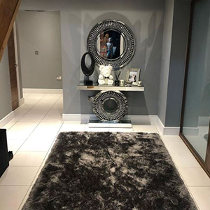 Danielle Lloyd's hallway with a mirrored console table