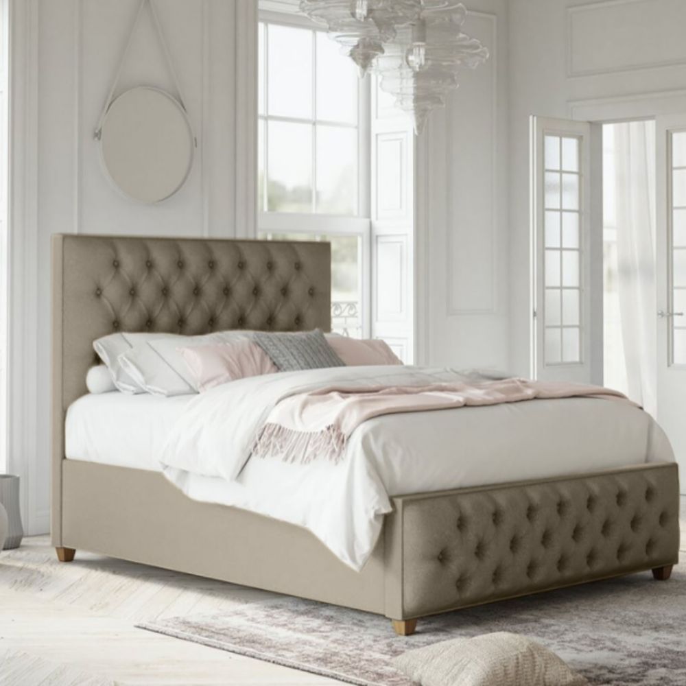modern bedroom design styling - fabric uphosltered bed, white pink and grey linens