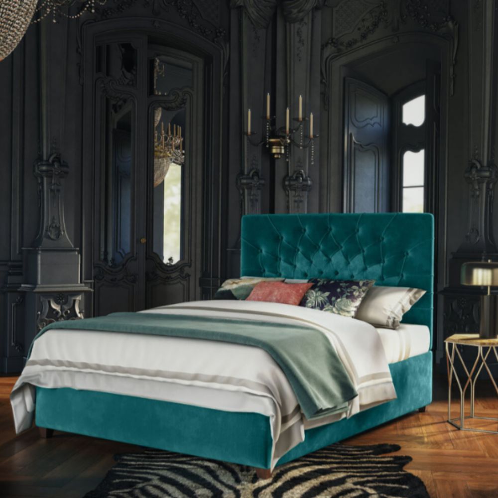get the best sleep in a teal velvet statement bed with green and white linens