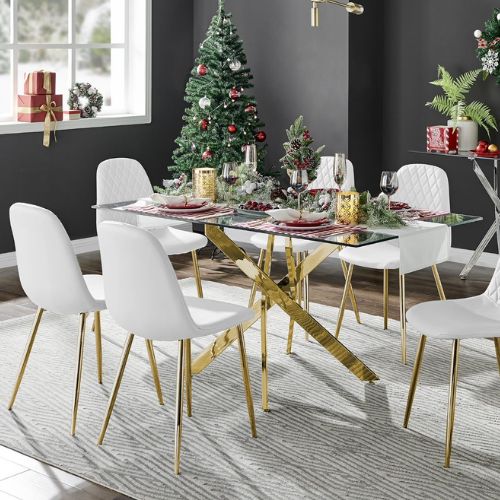 how to dress a table for christmas - glass dining table with gold starburst legs, white chairs with gold legs, red and gold table decor