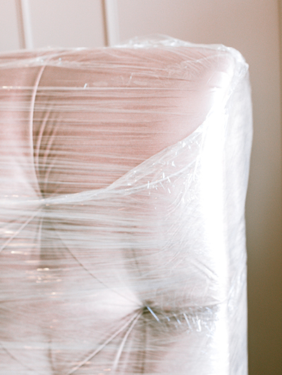 Wrap larger furniture items to protect against damage when moving house.