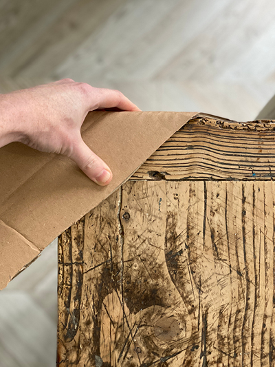 Use cardboard strips to protect corners of furniture when packing to move house.