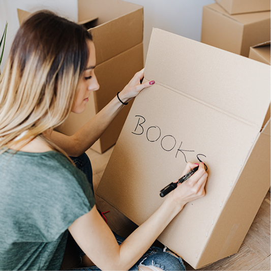 Labelling boxes makes packing to move to a new home much easier.