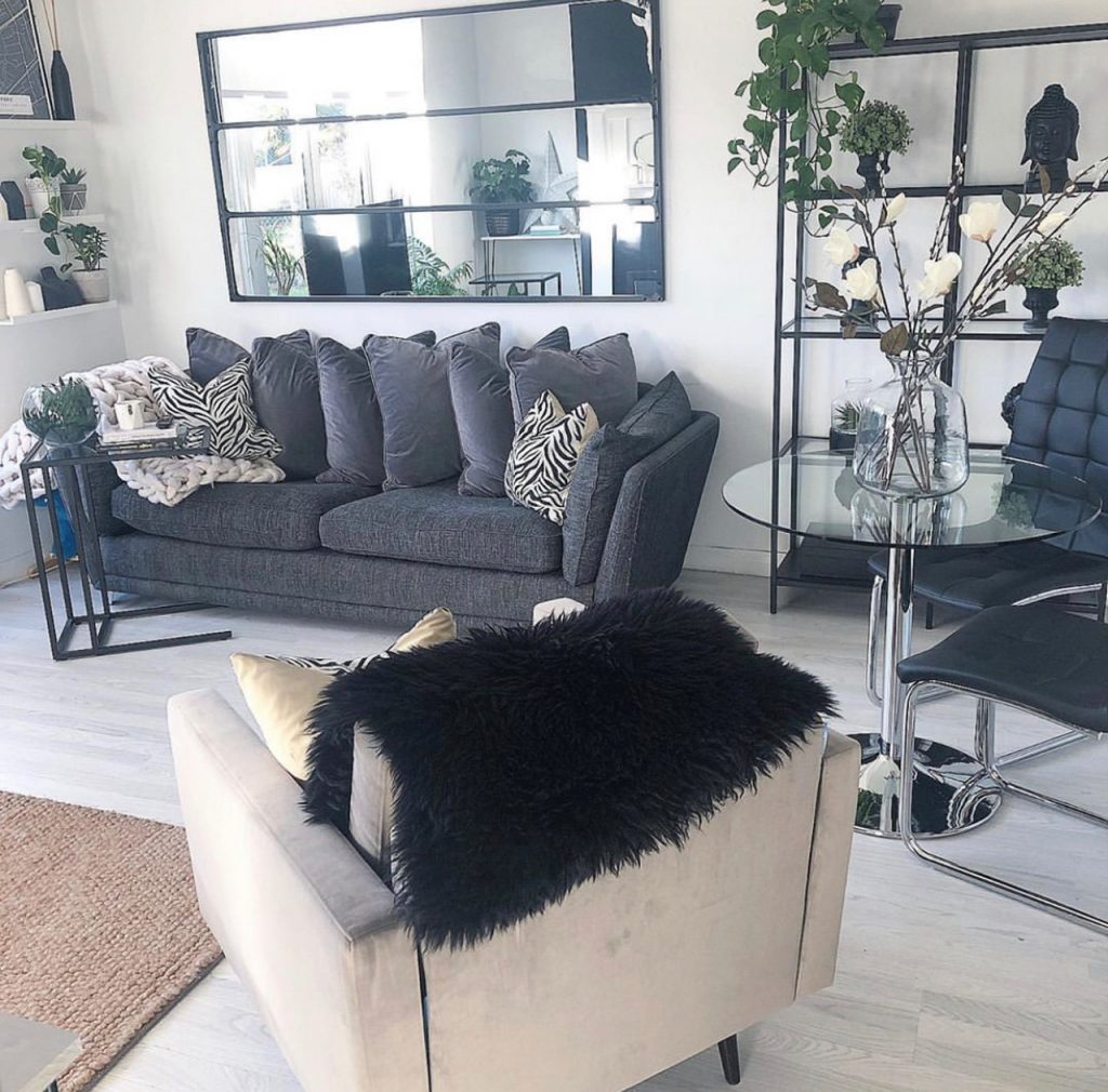 A living room that uses charcoal grey as an accent colour