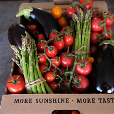 A box filled with fresh vegetables from Sprout and Flower, Mere