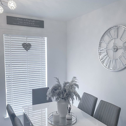 modern grey dining room with Mrs Hinch palque on wall and grey pampas grass