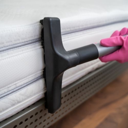 how to clean a mattress - hoover your mattress
