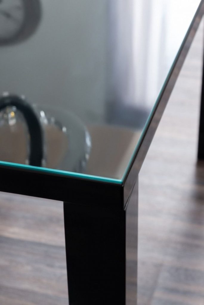 A table topper protecting a high gloss dining room table