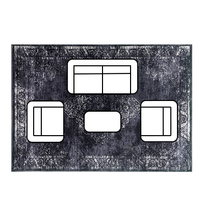 floor plan showing aerial view of sofa, 2 armchairs and a coffee table all placed on a dark vintage-inspired rug