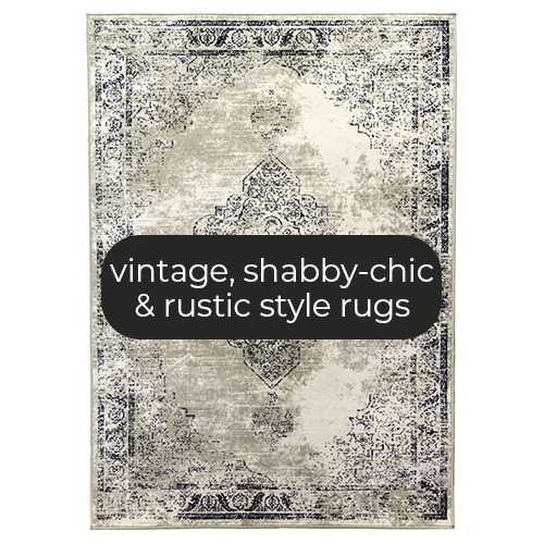 beige rug wuth faded/distressed vintage-style pattern. 