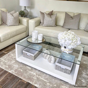 A white gloss and glass coffee table