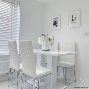 An all white dining room