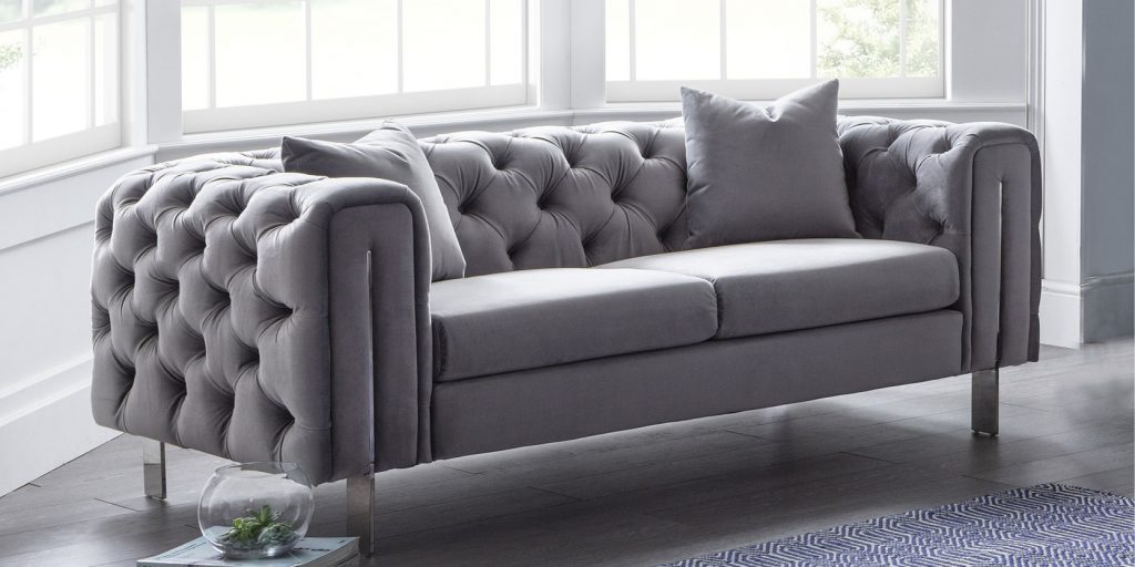 A chesterfield low back deep button sofa