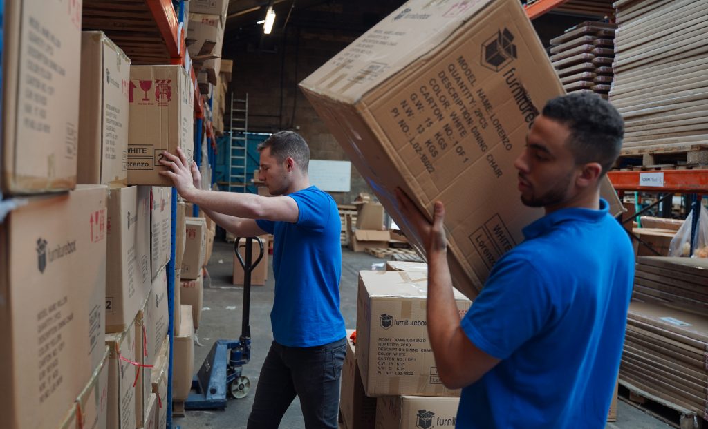 Furniture Box Dan Beckles (with facial hair) and Monty George the Co Founders and Directors of online furniture store 'Furniture Box'. Photographed at their Warehouse in Mere, Wltshire. 28th November 2018 Pic / Gareth Iwan Jones www.garethiwanjones.com