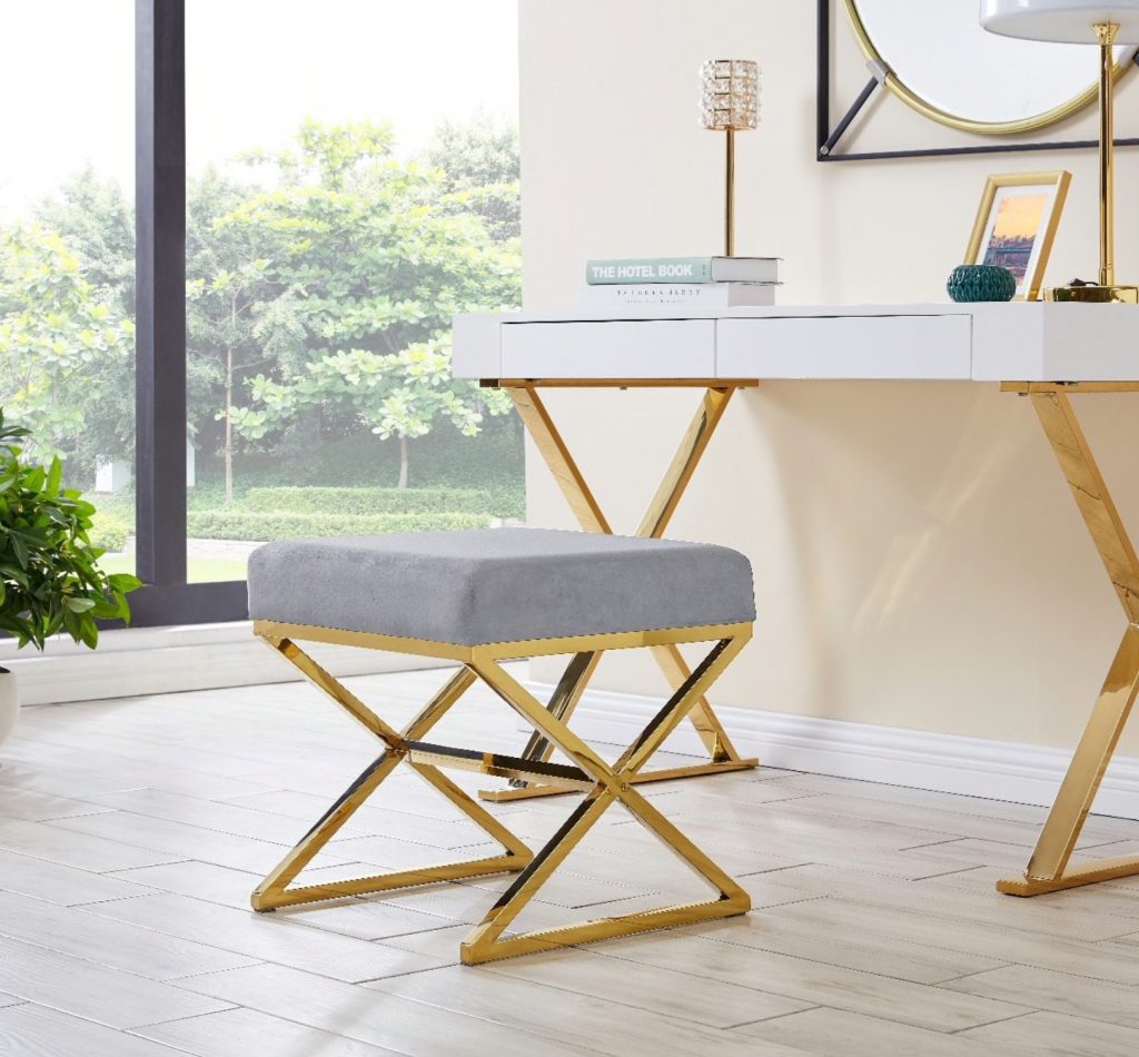 A gold and grey oxford stool as part of a dressing table