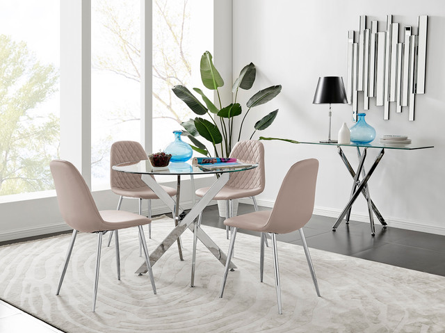 round glass dining table with silver chrome starburst nested legs and foru beige modern faux leather dining chairs with diamond stitching.