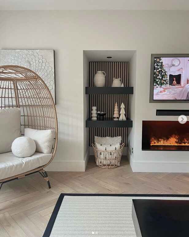 beige rattan egg chair in modern living room