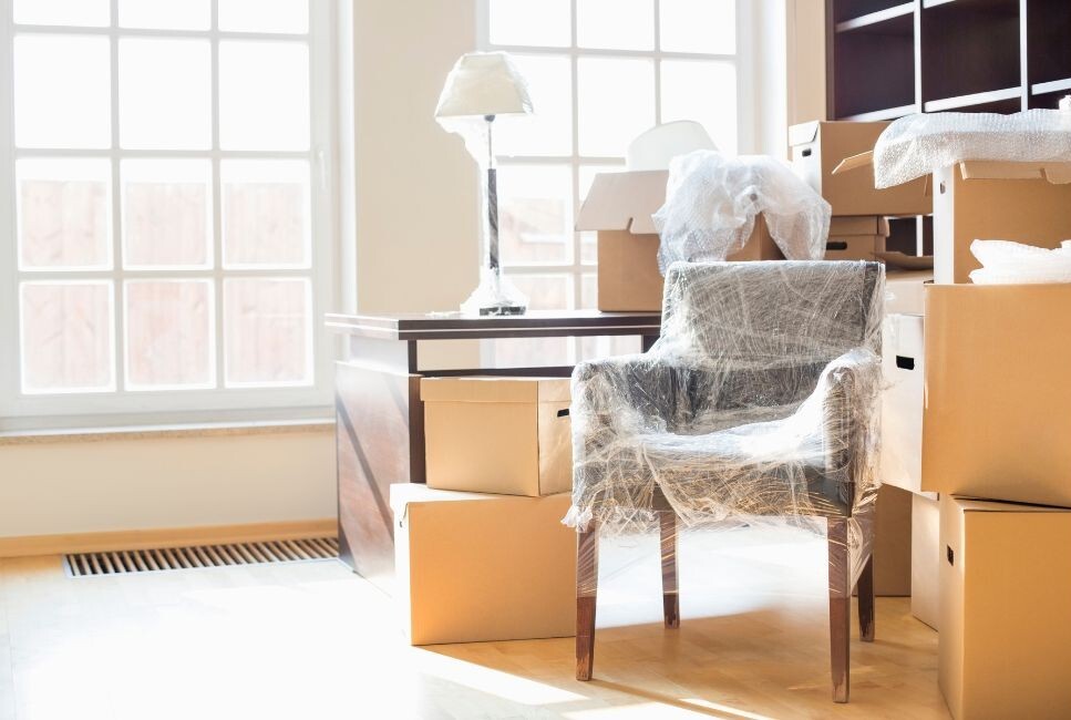 moving into new home interior full of boxes