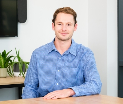 Furniturebox Co Founder and Managing Director Monty George - caucasian male, fair hair, blue check shirt