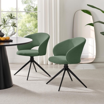green fabric dining chairs in modern dining room