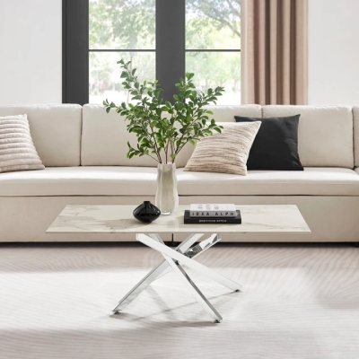 light and airy marble effect and silver leg coffee table in bright living room