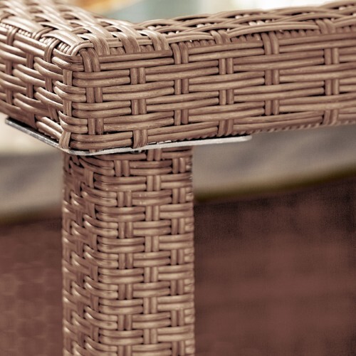 close up of a brown rattan garden table top corner