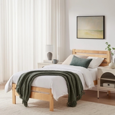 Luxury Single Bed Kids Bedroom - oak bedframe, soft grey beige and green linens, cream bedside table 