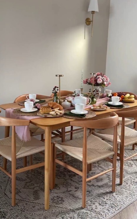 valentines day at home ideas afternoon tea on wooden dining table with pink and green colour scheme and tablescaping